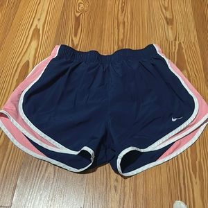 navy and pink nike shorts